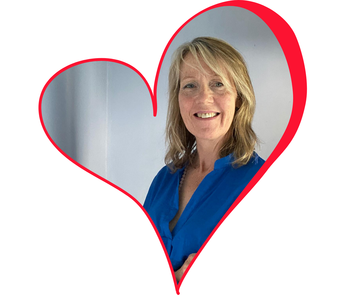 Rowana, founder of NOSH ROCKS, framed in the NOSH ROCKS heart